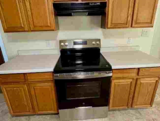 419 1/2 29 1/2 Road Grand Junction, CO 81504 - Photo 15 of 36 a stove top oven sitting inside of a kitchen