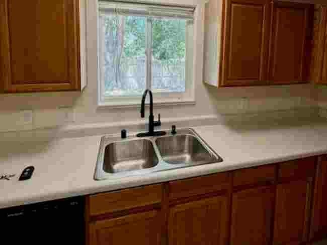419 1/2 29 1/2 Road Grand Junction, CO 81504 - Photo 16 of 36 a kitchen with a sink a cabinets and window
