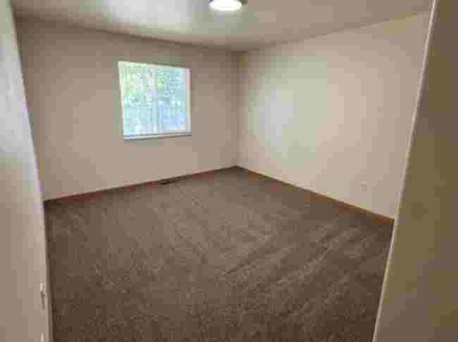 419 1/2 29 1/2 Road Grand Junction, CO 81504 - Photo 21 of 36 an empty room with windows