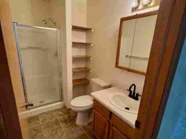 419 1/2 29 1/2 Road Grand Junction, CO 81504 - Photo 23 of 36 a bathroom with a sink a toilet and shower