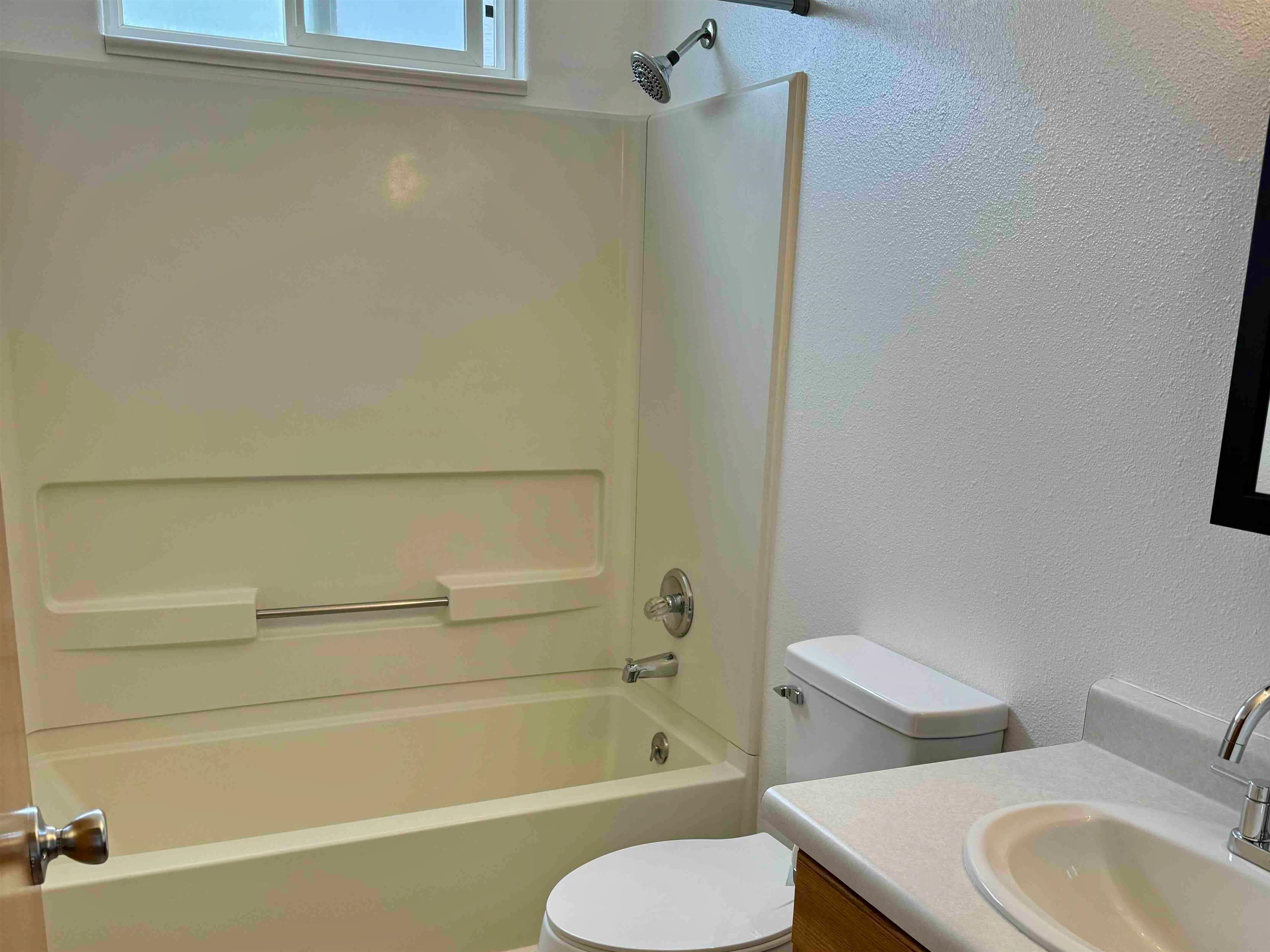 419 1/2 29 1/2 Road Grand Junction, CO 81504 - Photo 24 of 36 a bathroom with a toilet and a bathtub