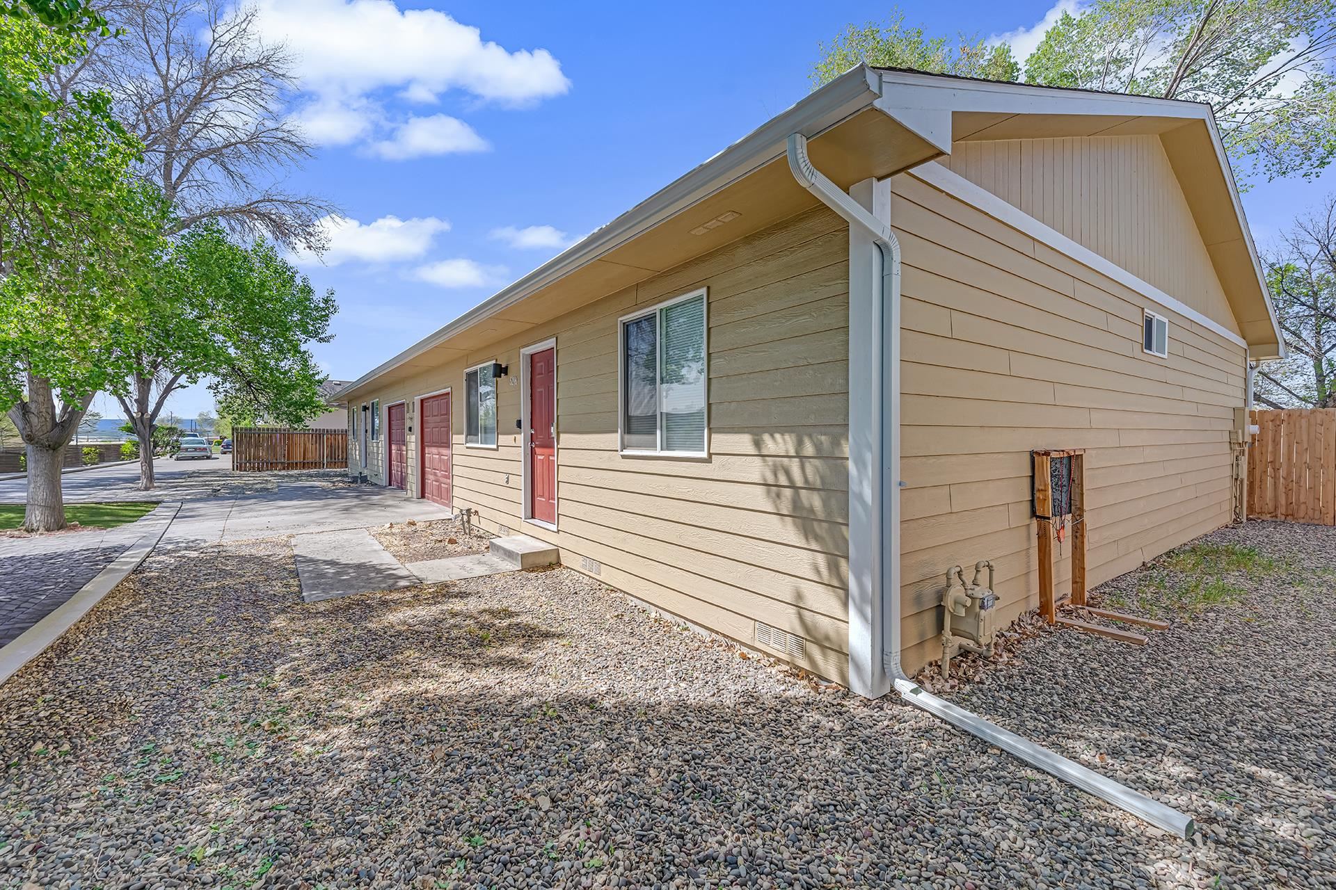 419 1/2 29 1/2 Road Grand Junction, CO 81504 - Photo 28 of 36 a view of a house with a yard