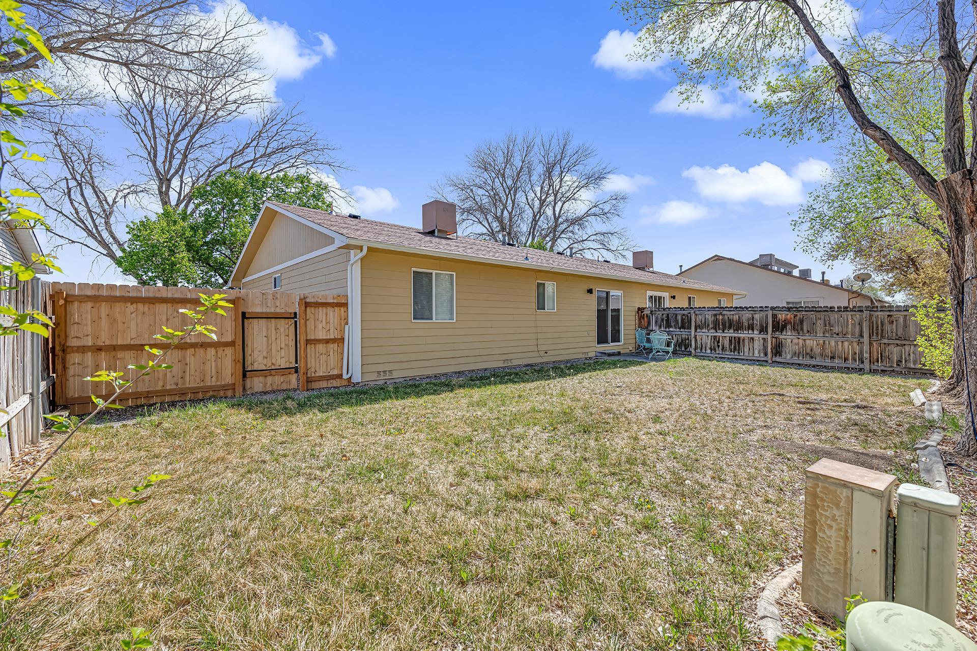 419 1/2 29 1/2 Road Grand Junction, CO 81504 - Photo 29 of 36 a view of a house with a yard