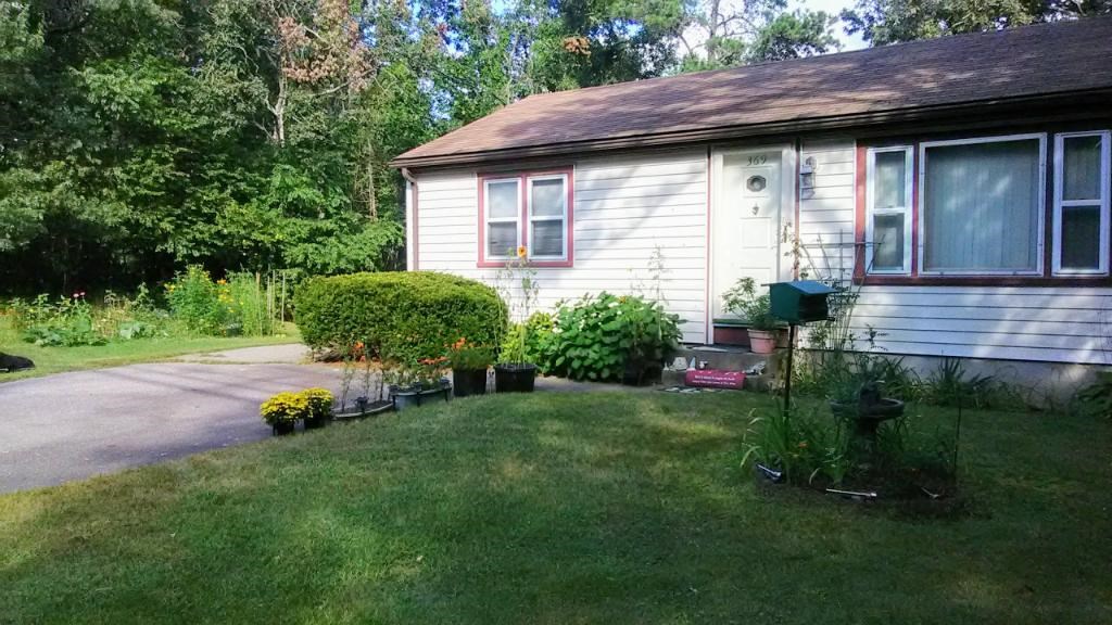 369 Holly Road South Kingstown, RI 02879 - Photo 1 of 14 Front of house with view of gardens.