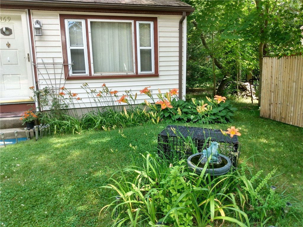 369 Holly Road South Kingstown, RI 02879 - Photo 3 of 14 Front of house with Lilies