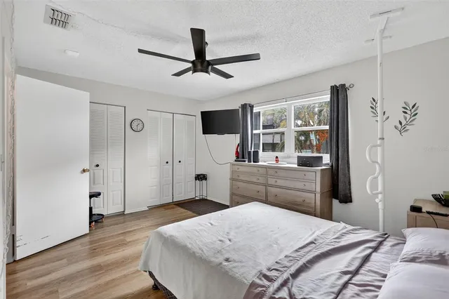 a bathroom with a sink vanity and mirror