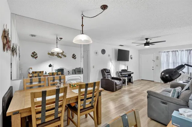 a view of a dining room with furniture