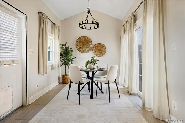 a kitchen with stainless steel appliances kitchen island granite countertop a sink and cabinets
