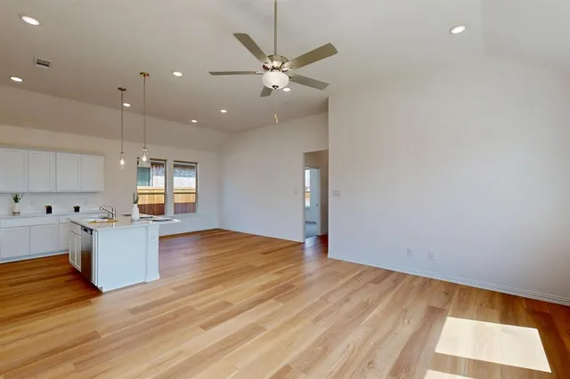a view of kitchen and windows