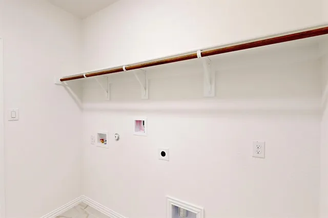 a view of small space with racks on the wall