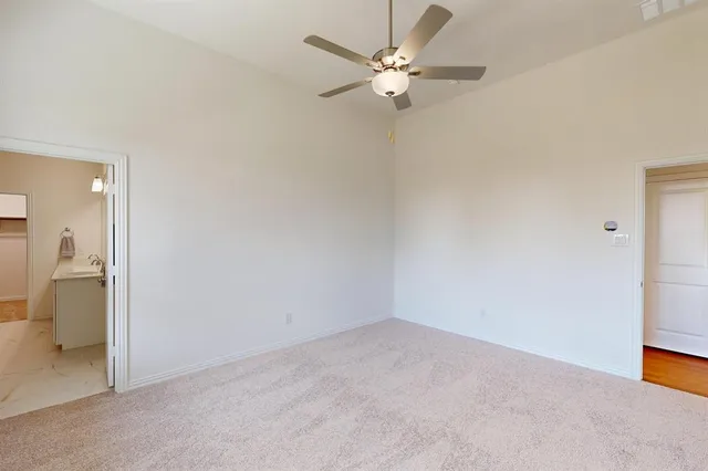 an empty room with a bathroom