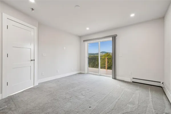 an empty room with closet area