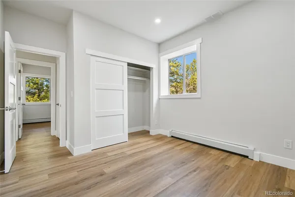 a view of a lake with outdoor space and sitting area