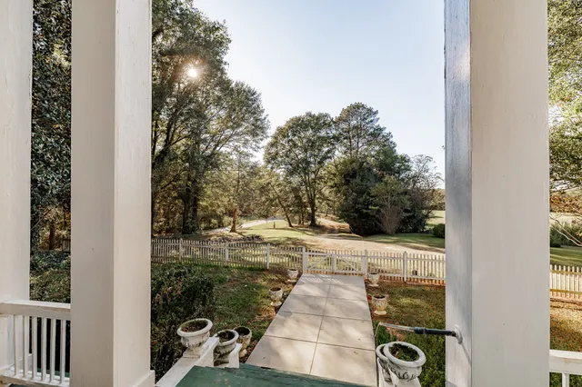 a view of a backyard of the house