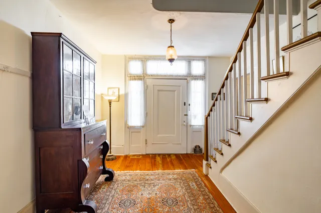 a view of an entryway with staircase