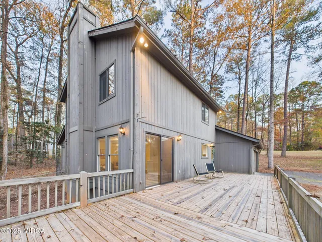a view of garage yard and tree