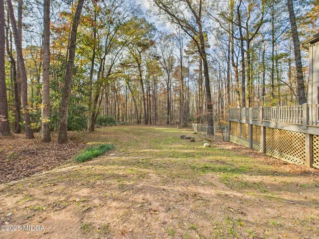 a house with trees in front of it