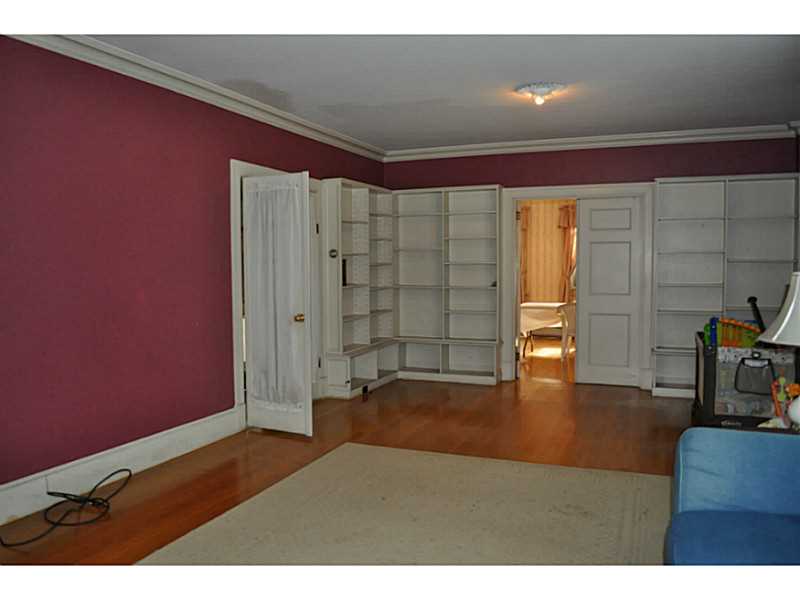75 North Hill Road Burrillville, RI 02830 - Photo 5 of 24 Living Room. Built in book shelves, French doors to entry hall and formal dining room.