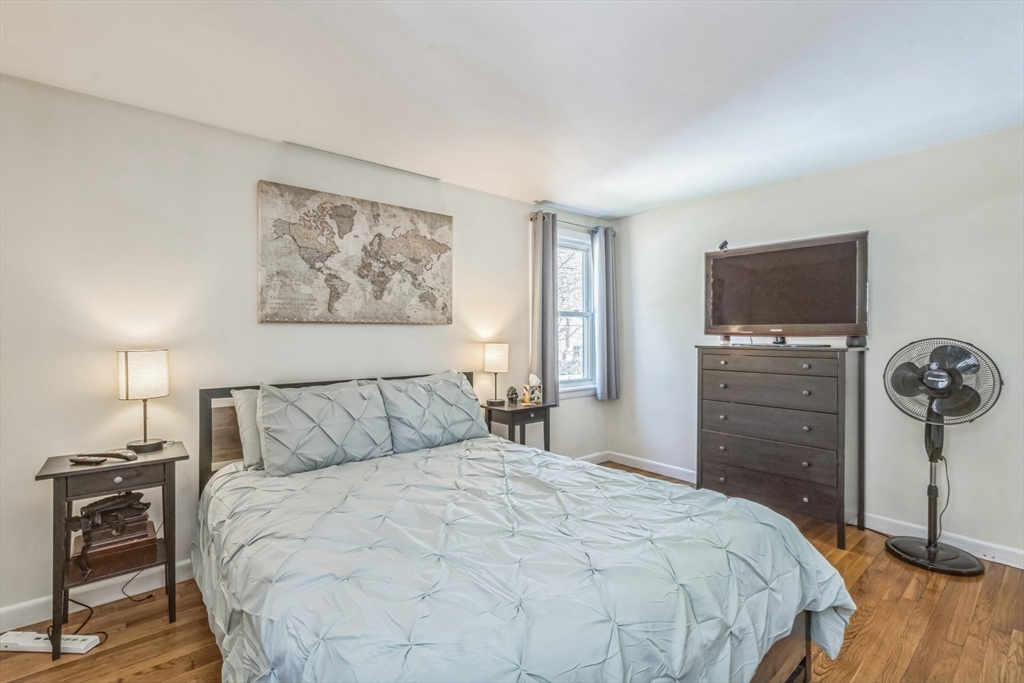 156 Andover Road Billerica, MA 01821 - Photo 14 of 22 a bedroom with a bed and a tv