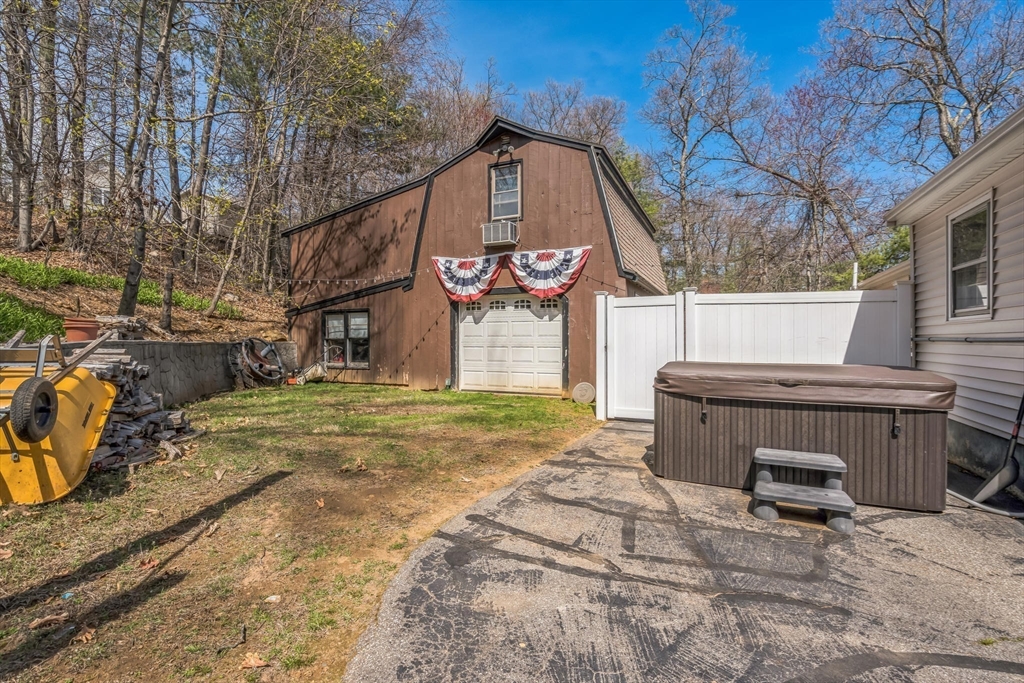 156 Andover Road Billerica, MA 01821 - Photo 22 of 22 a front view of a house with garden