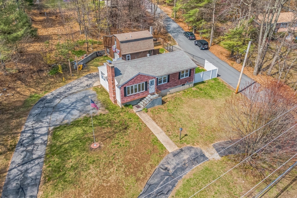 156 Andover Road Billerica, MA 01821 - Photo 3 of 22 a view of a street with a building in the background