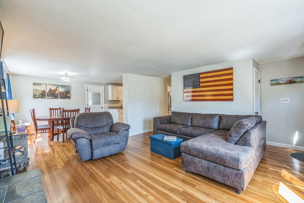 156 Andover Road Billerica, MA 01821 - Photo 6 of 22 a living room with furniture and a wooden floor