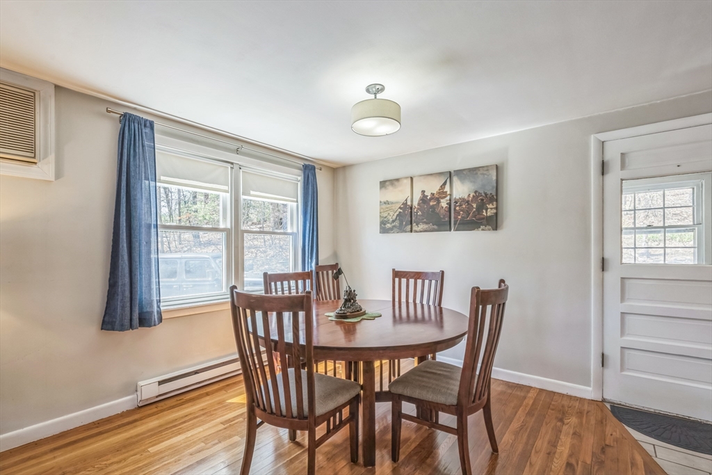 156 Andover Road Billerica, MA 01821 - Photo 7 of 22 a view of a dining room with furniture window and wooden floor