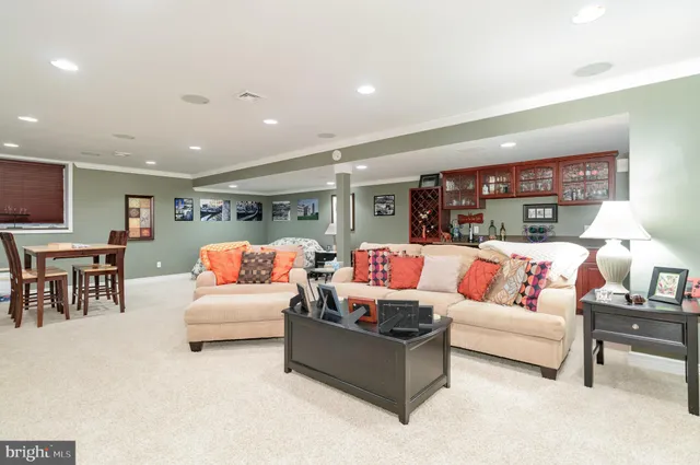 a living room with furniture and a table