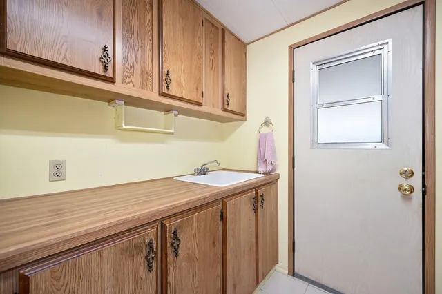 a utility room with a sink