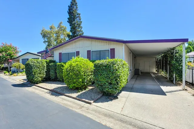 front view of a house with a street