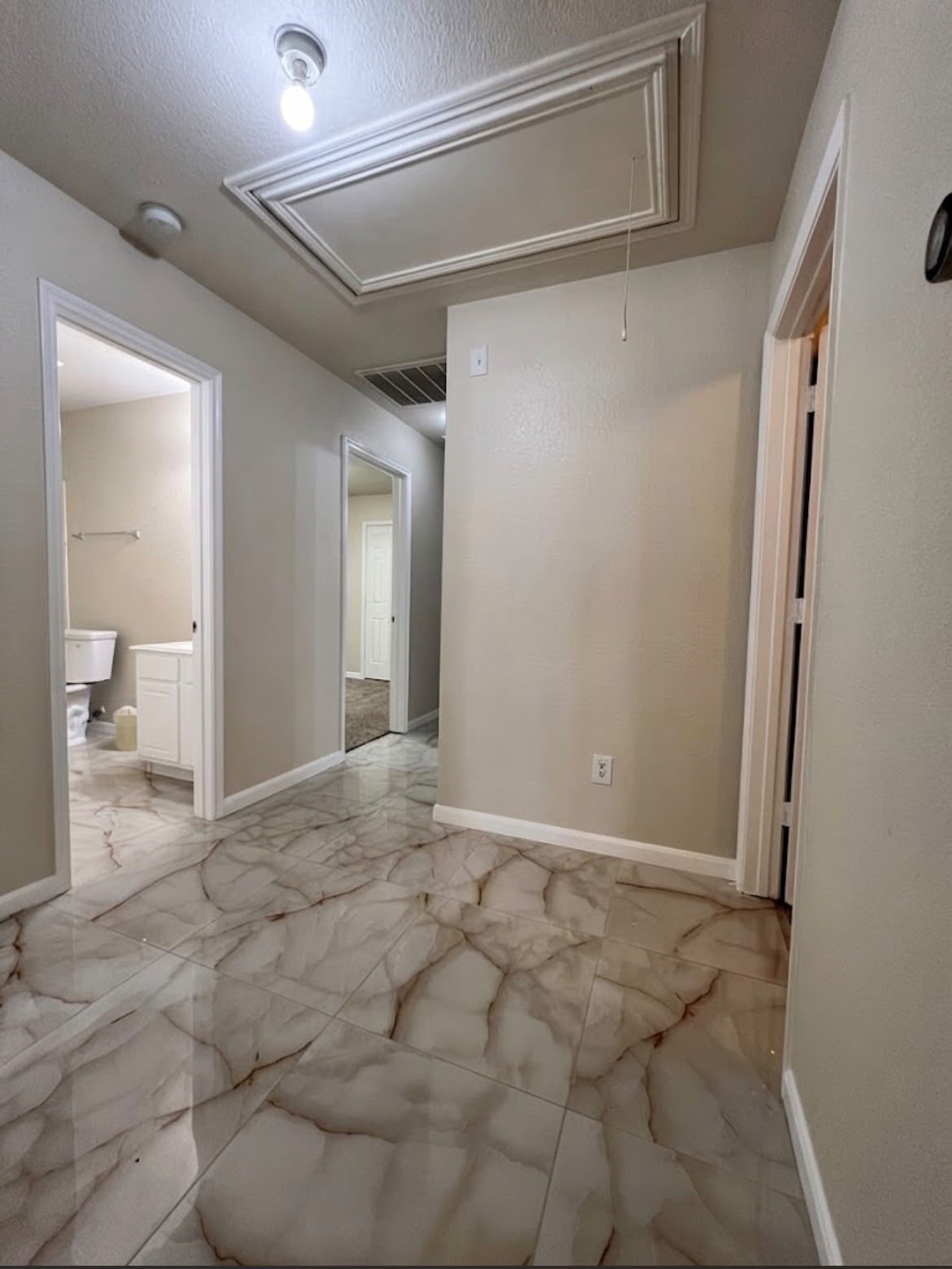 19603 Rippling Brook Lane Tomball, TX 77375 - Photo 13 of 16 Bright hallway leading to the bedrooms.