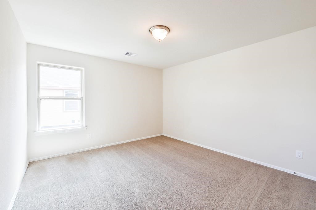 247 Sintra Lk Way Rosenberg, TX 77469 - Photo 21 of 28 an empty room with a window