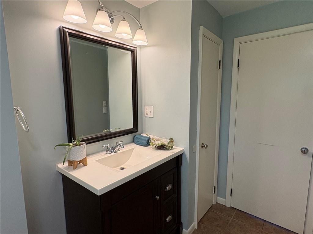 320 Cherry Hill Road Greenville, PA 16125 - Photo 18 of 38 a bathroom with a sink and a mirror