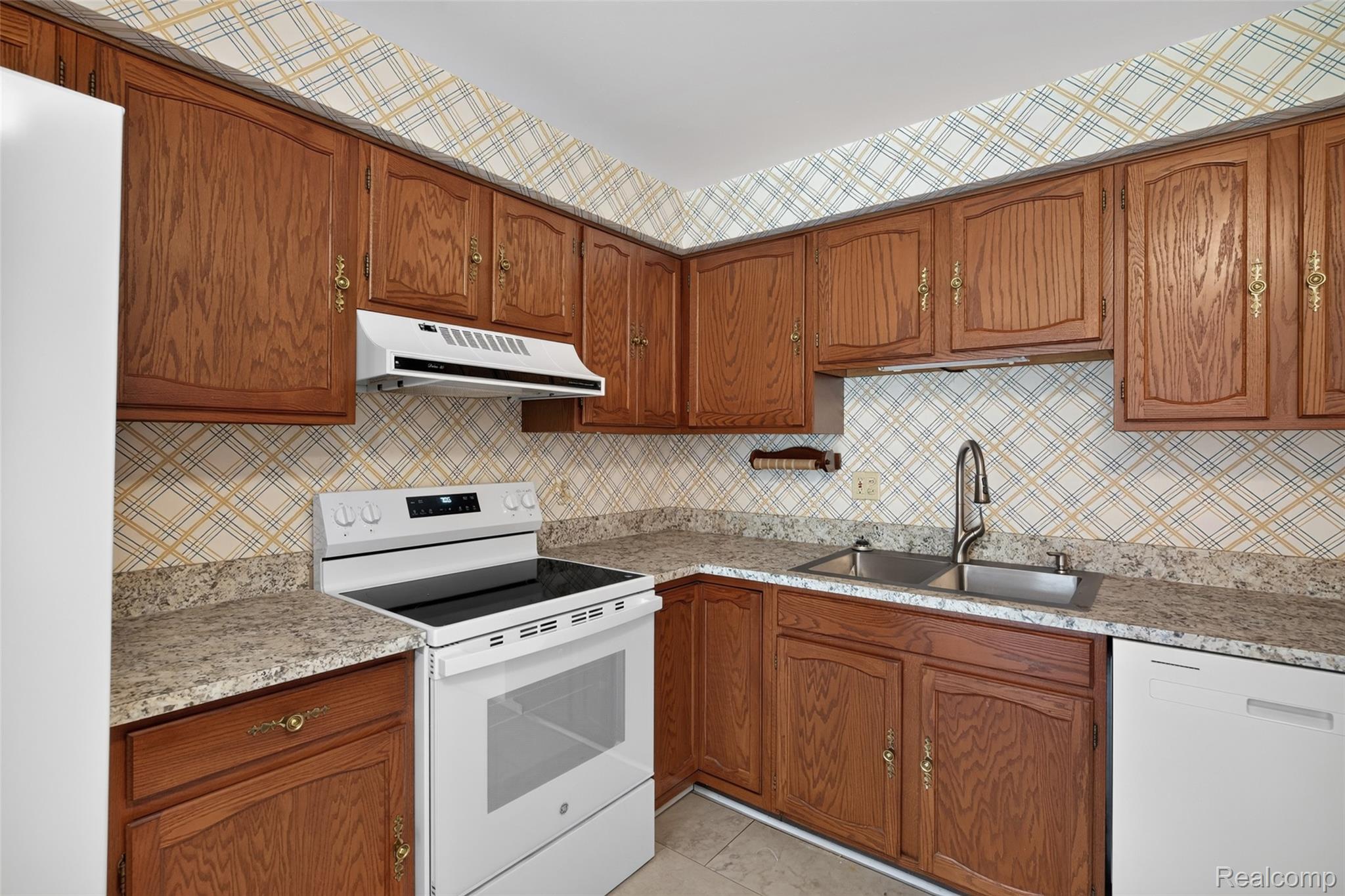 1225 Derby Road, Unit 3 Birmingham, MI 48009 - Photo 8 of 19 Double sink, New range open kitchen with plenty of counter space to cook and entertain.