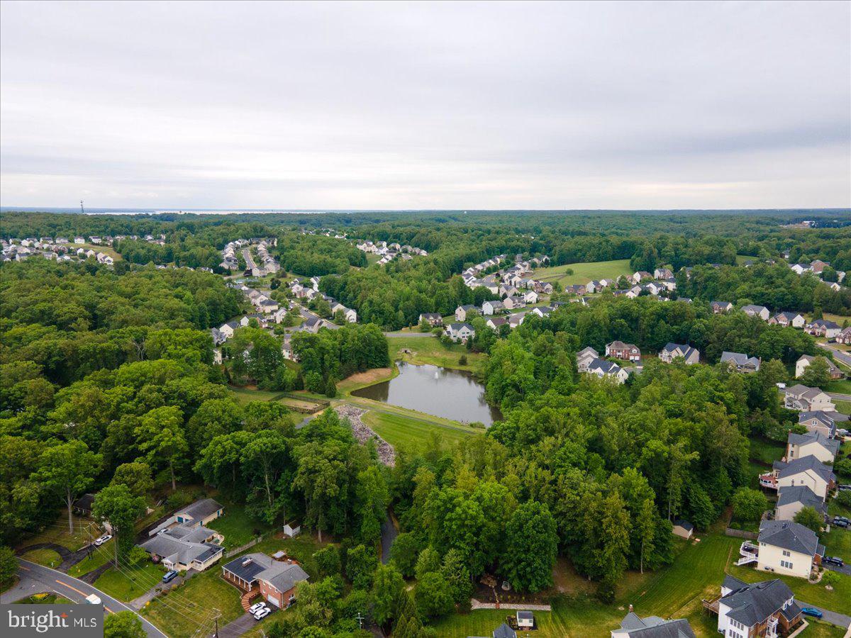 18309 Cabin Road Triangle, VA 22172 - Photo 40 of 42 an aerial view of a city with lots of residential buildings