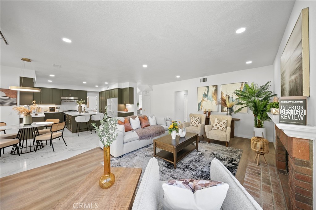 21111 Stockton Pass Road Walnut, CA 91789 - Photo 12 of 33 a living room with furniture wooden floor and a table