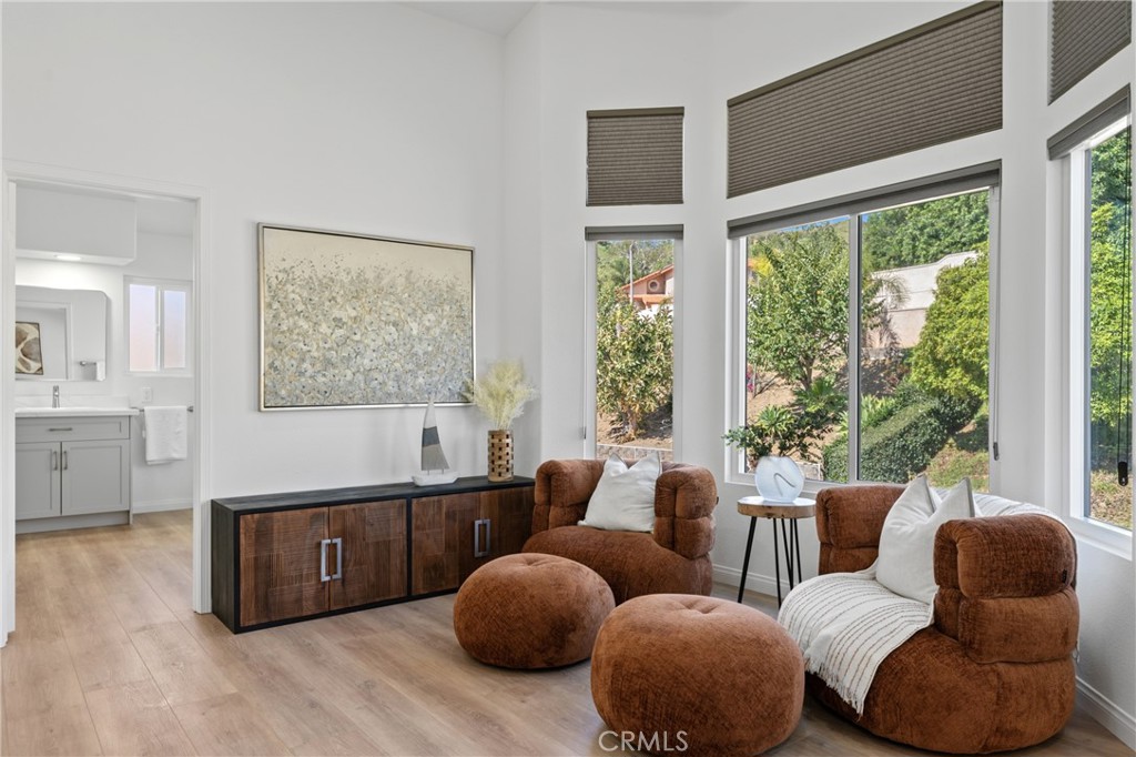 21111 Stockton Pass Road Walnut, CA 91789 - Photo 17 of 33 a living room with furniture and a large window