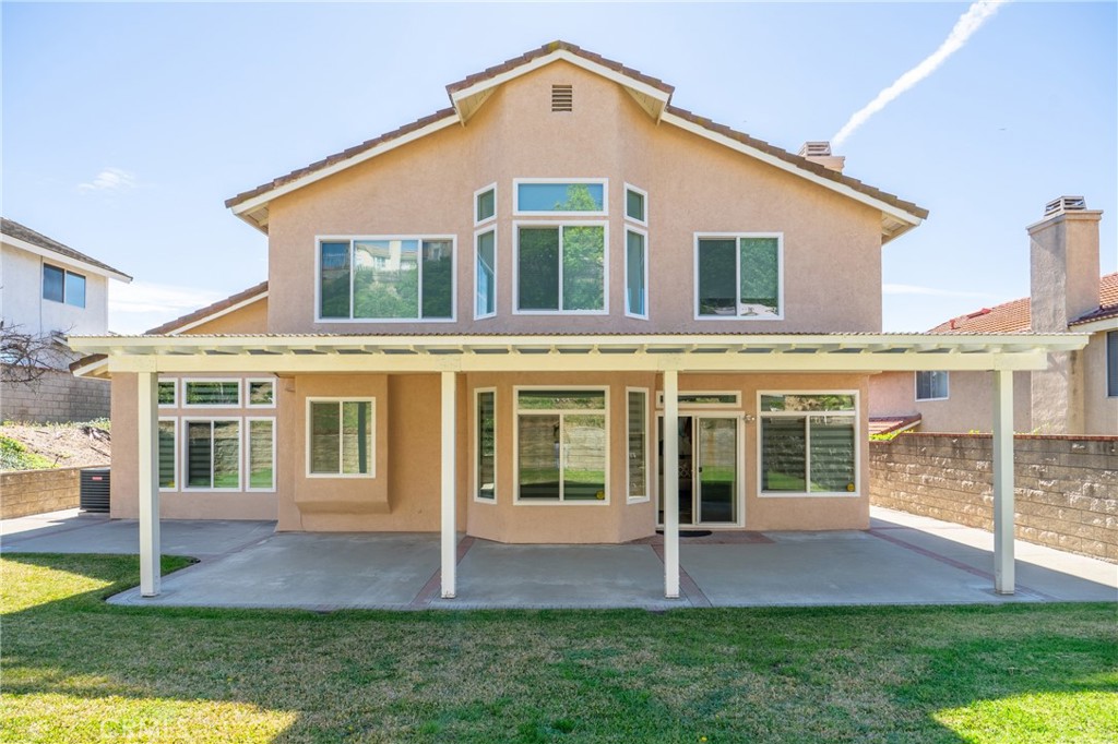 21111 Stockton Pass Road Walnut, CA 91789 - Photo 28 of 33 a view of house with a yard
