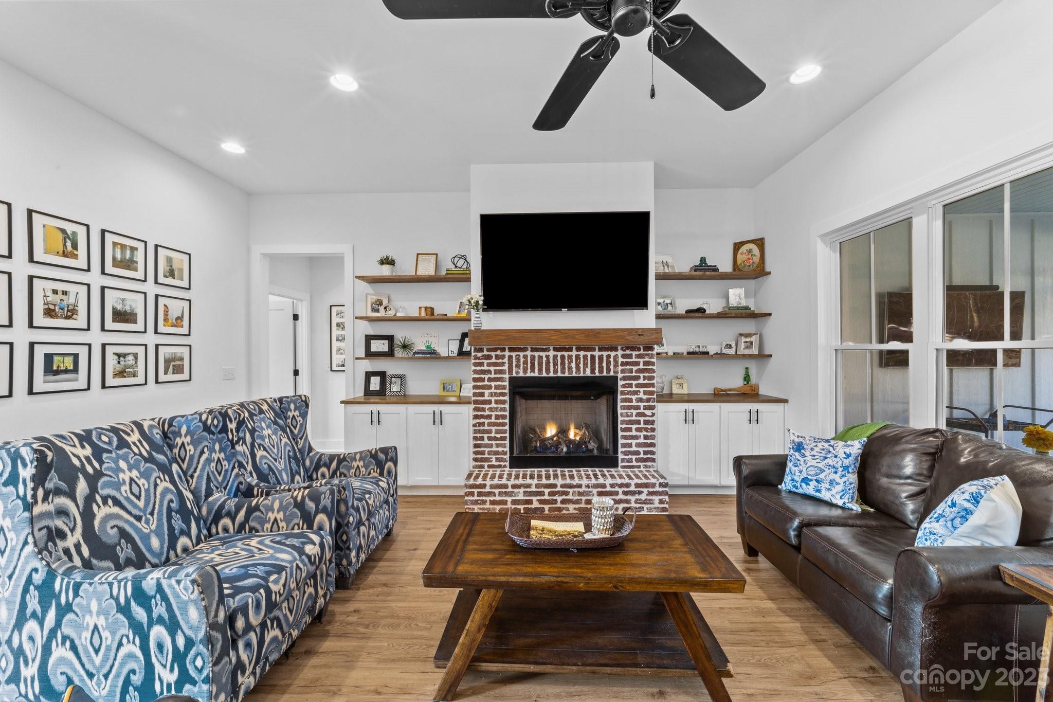 1490 Agner Road Salisbury, NC 28146 - Photo 17 of 47 a living room with furniture fireplace and flat screen tv