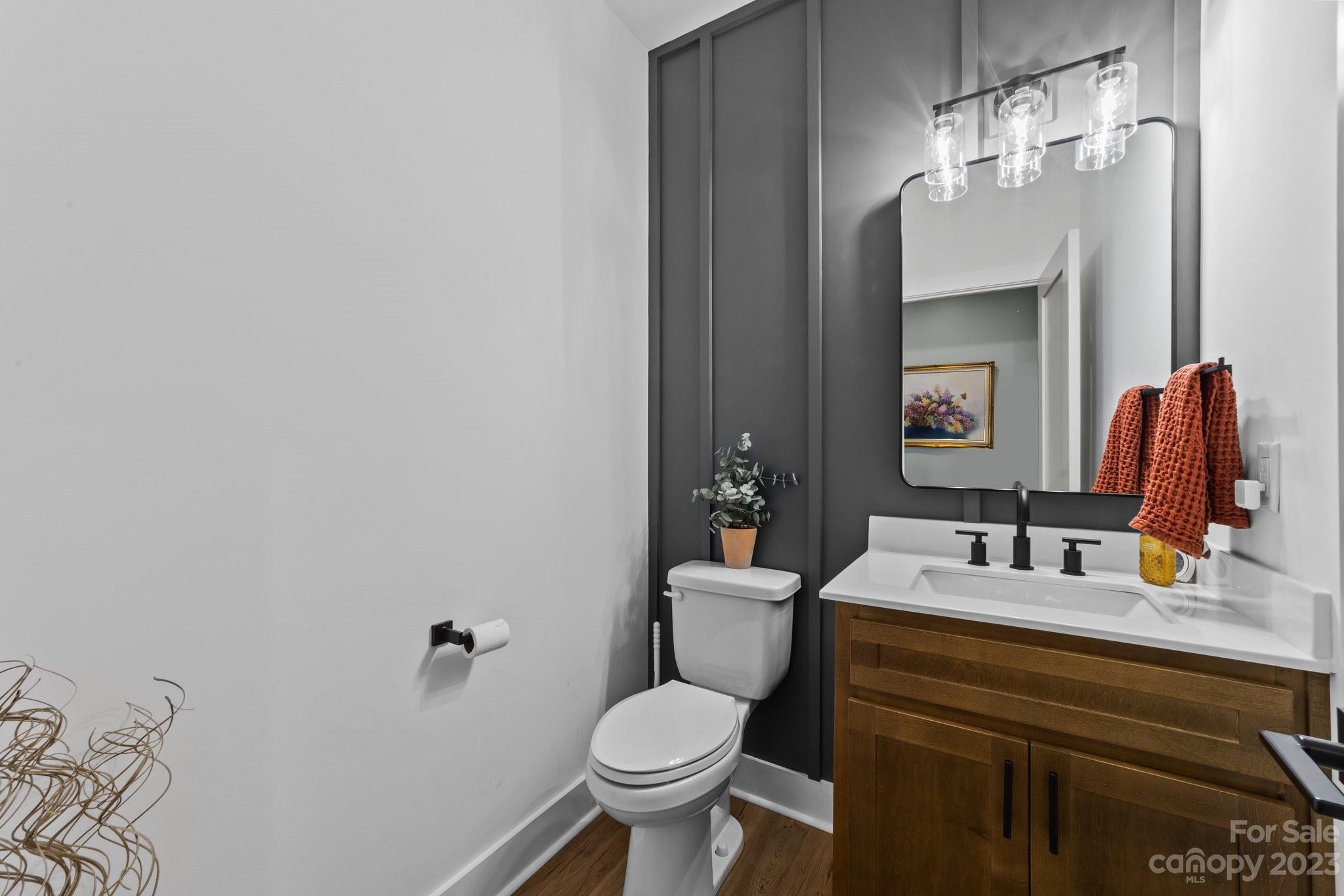 1490 Agner Road Salisbury, NC 28146 - Photo 20 of 47 a bathroom with a toilet sink and mirror