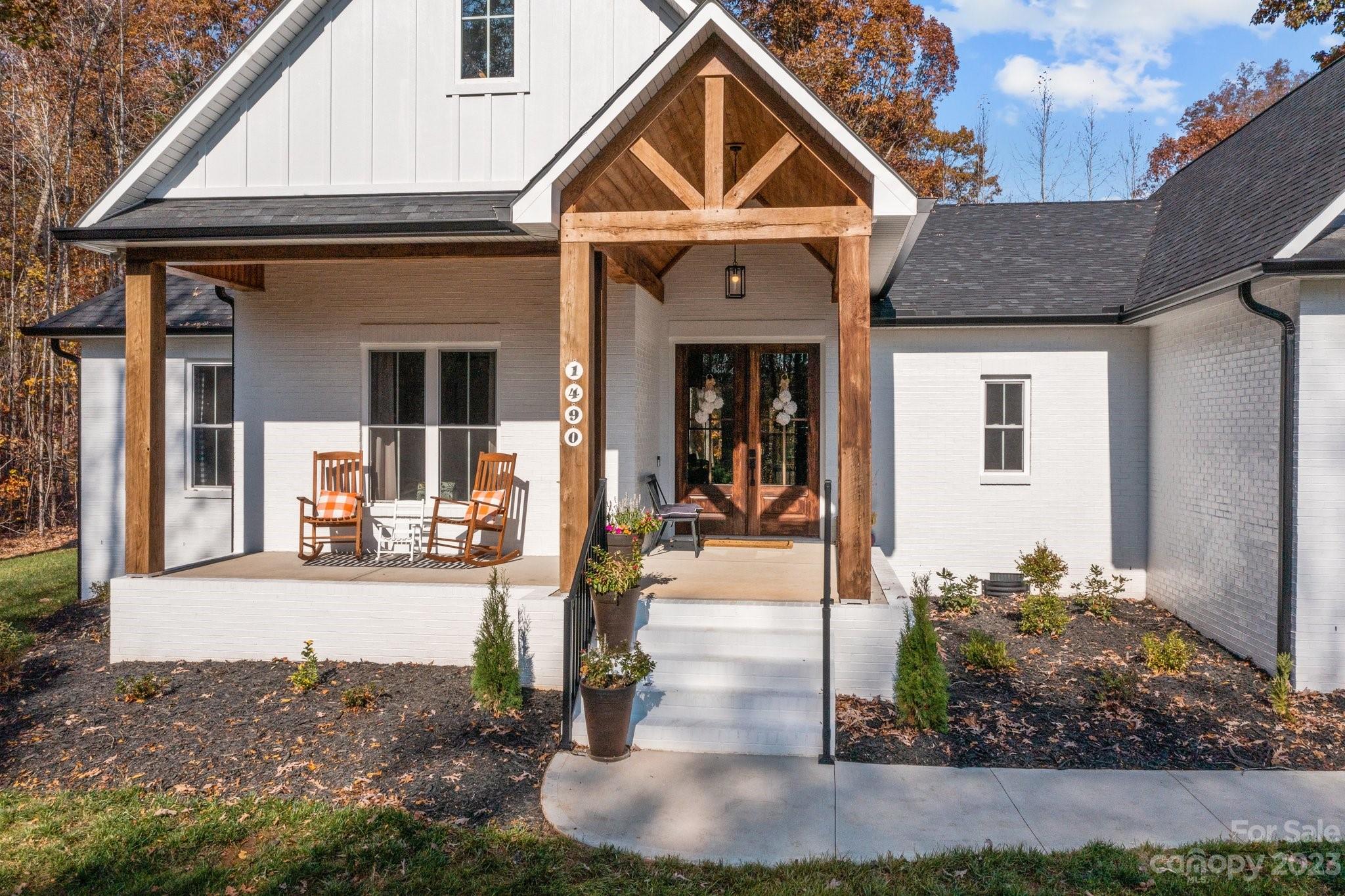1490 Agner Road Salisbury, NC 28146 - Photo 2 of 47 a front view of a house with garden