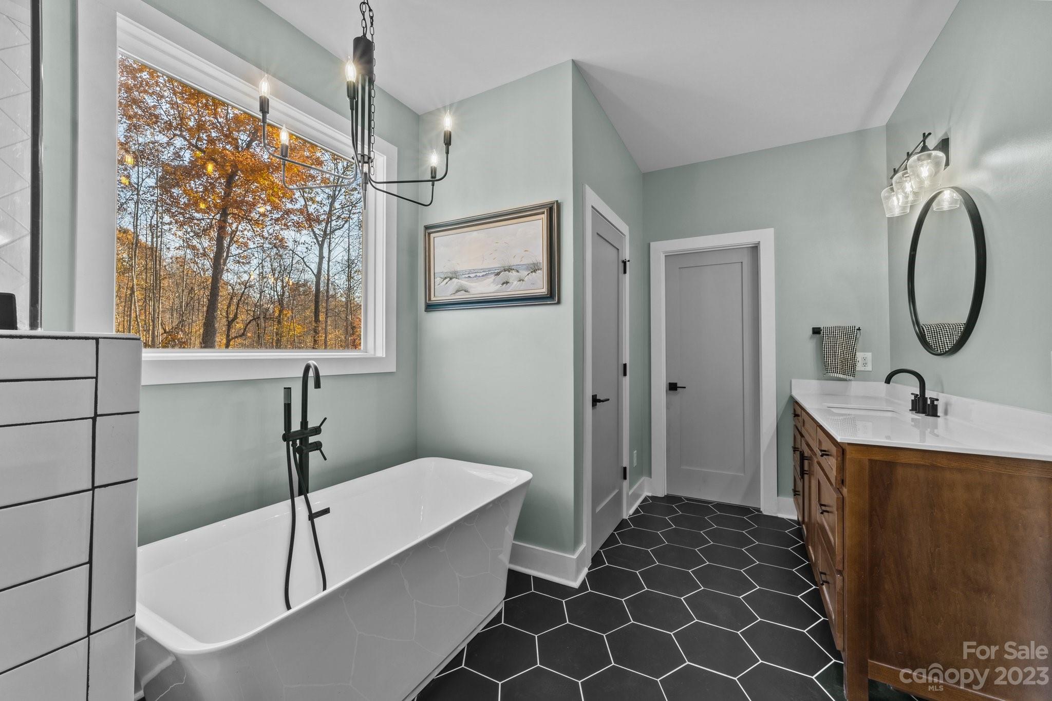 1490 Agner Road Salisbury, NC 28146 - Photo 24 of 47 a bathroom with a sink and a mirror