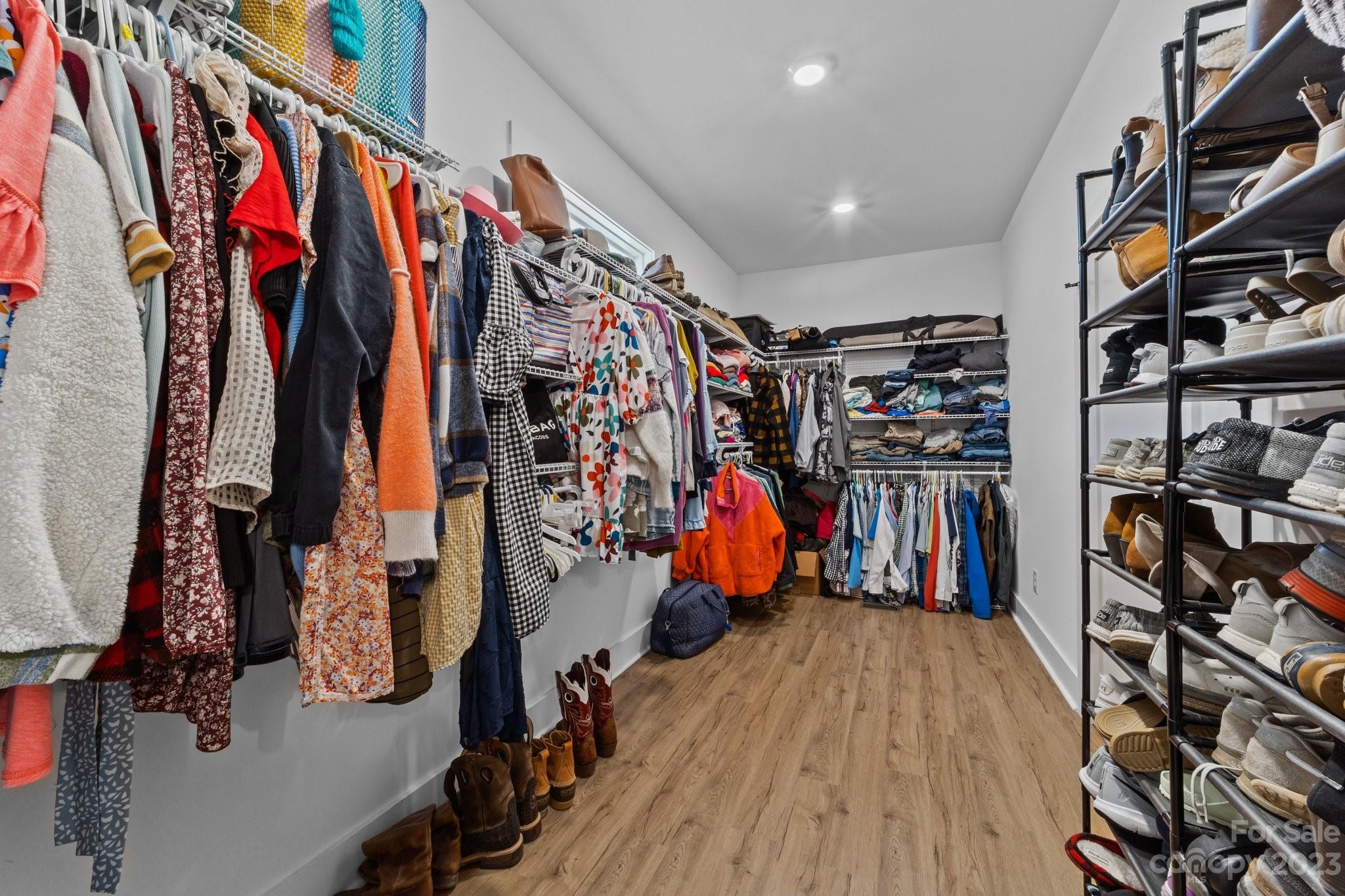 1490 Agner Road Salisbury, NC 28146 - Photo 25 of 47 a view of walk in closet with clothes and shoes