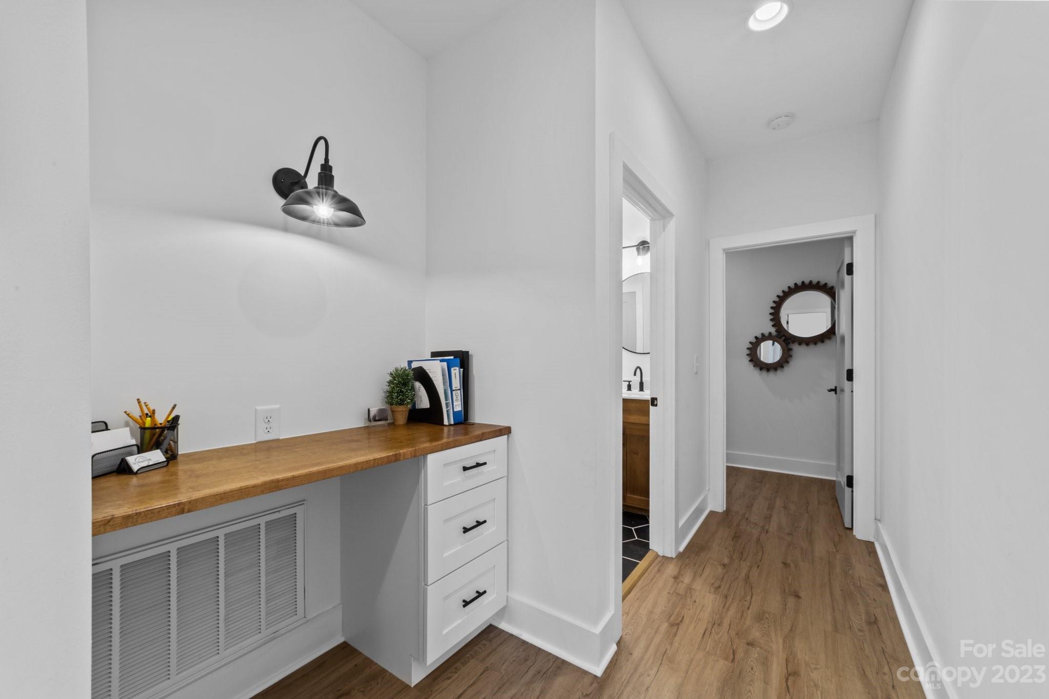 1490 Agner Road Salisbury, NC 28146 - Photo 31 of 47 a hallway with a white cabinets