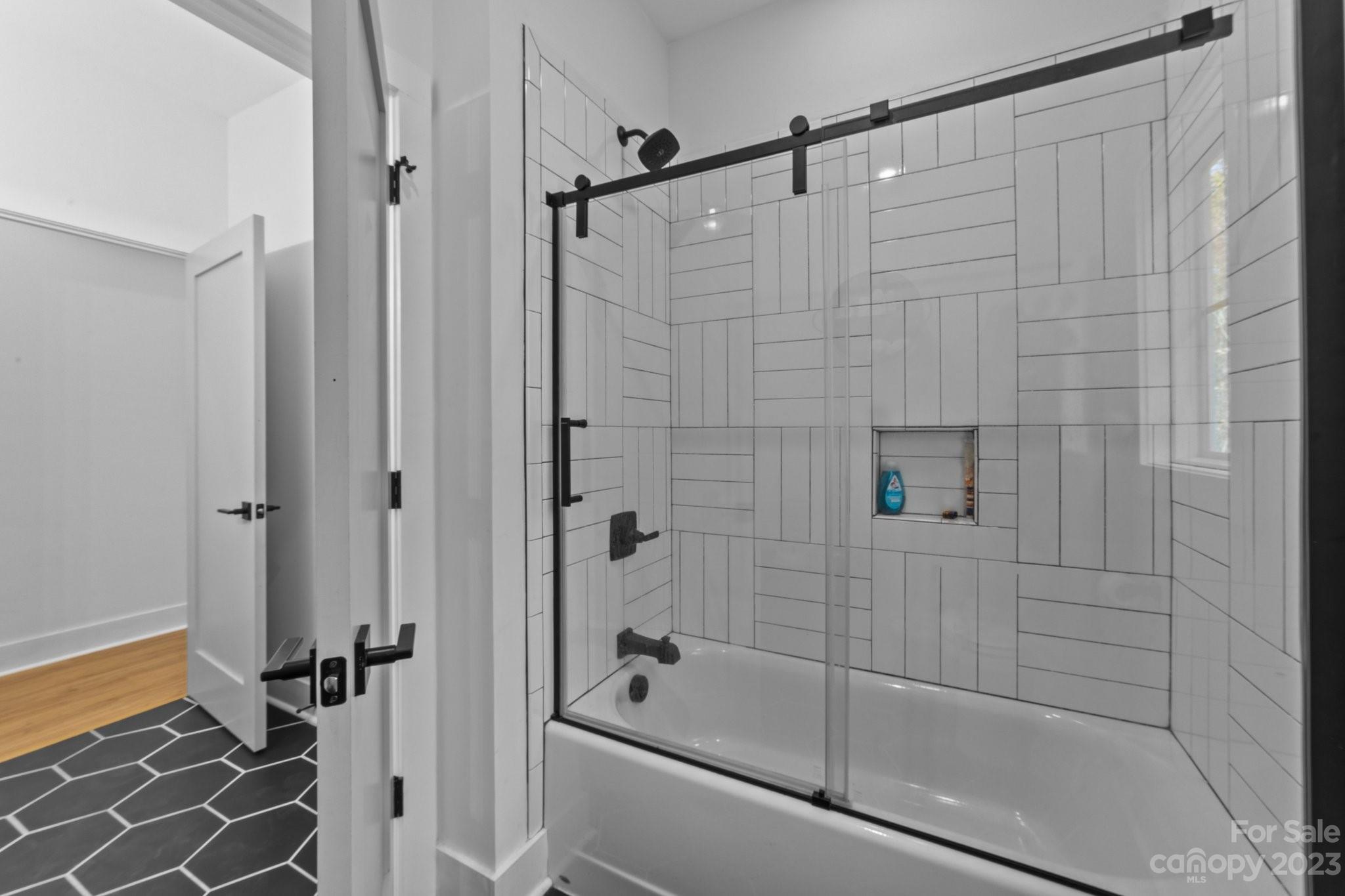 1490 Agner Road Salisbury, NC 28146 - Photo 33 of 47 a bathroom with a bathtub and a shower