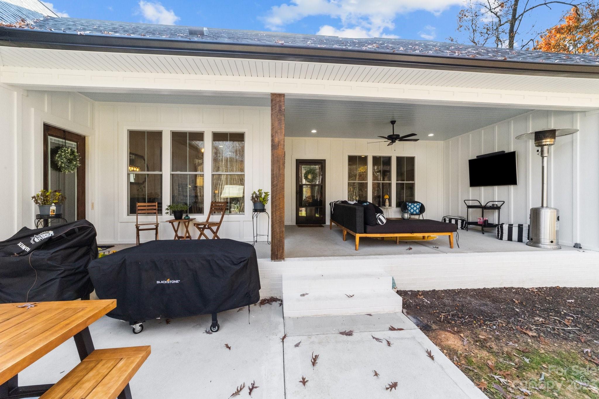 1490 Agner Road Salisbury, NC 28146 - Photo 37 of 47 a living room with furniture and a flat screen tv