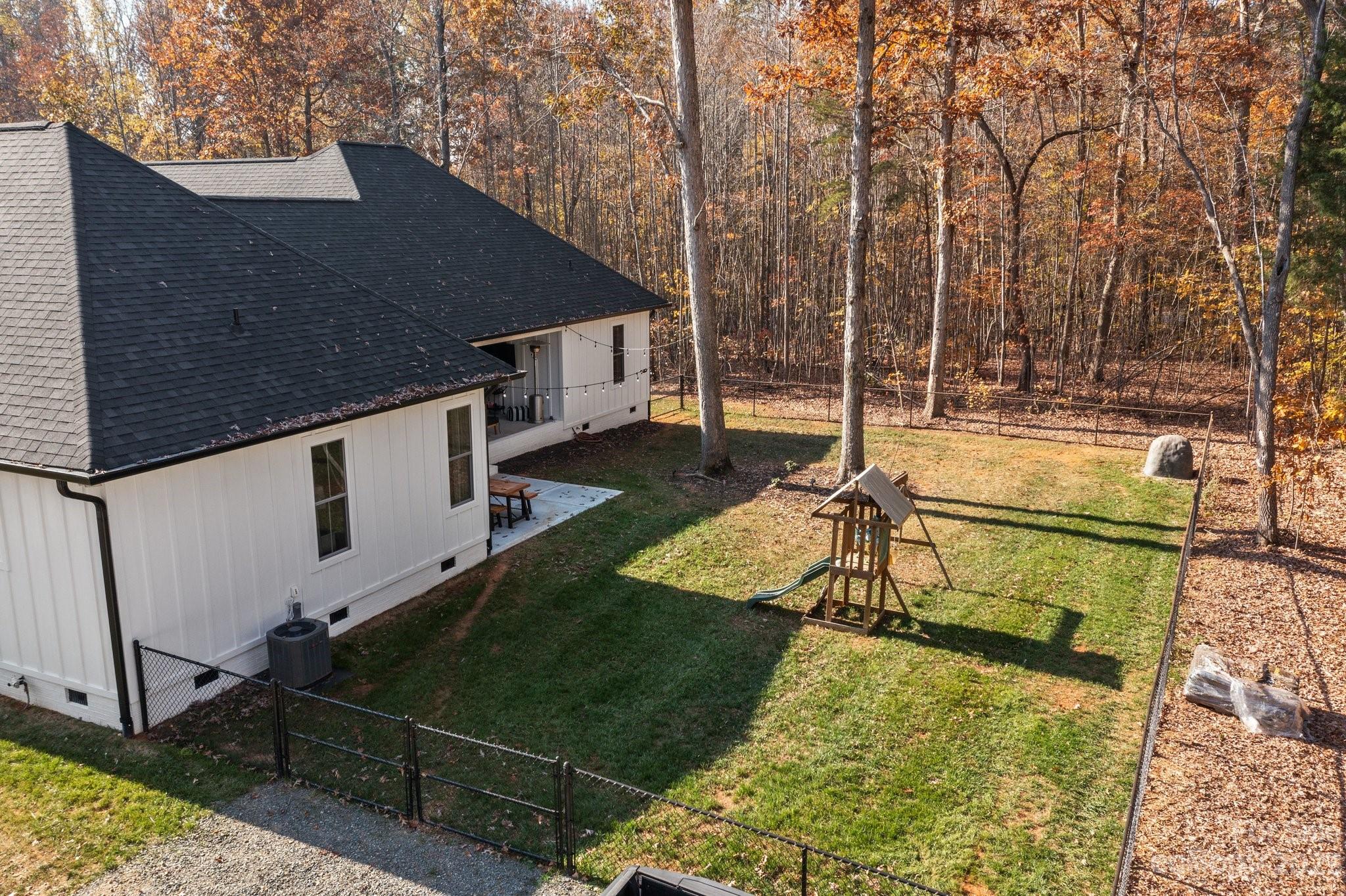 1490 Agner Road Salisbury, NC 28146 - Photo 40 of 47 a view of a backyard with chairs