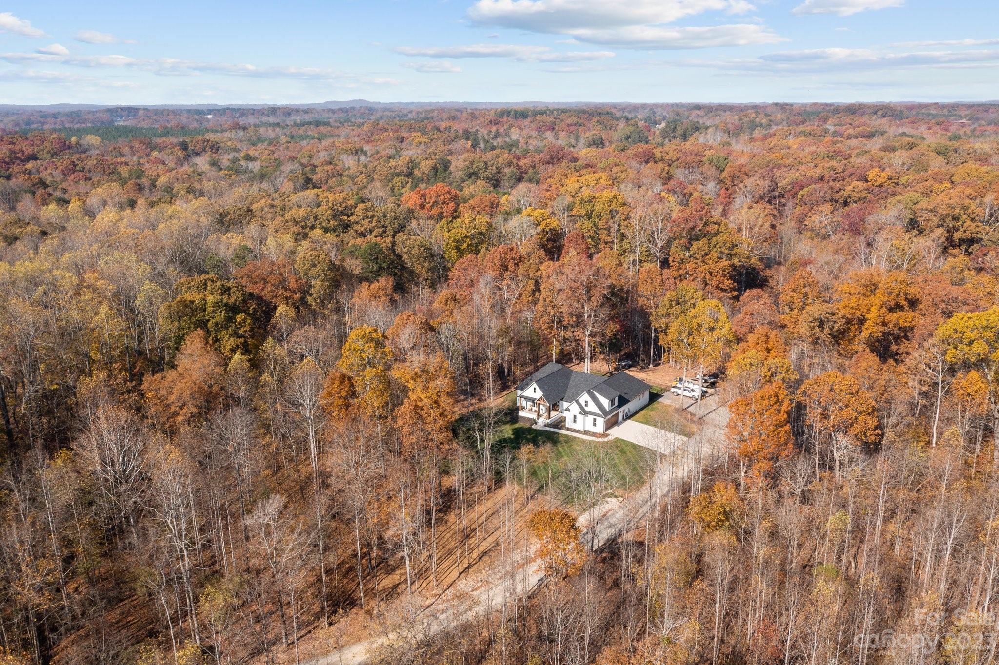 1490 Agner Road Salisbury, NC 28146 - Photo 44 of 47 an aerial view of house with yard and mountain in the back