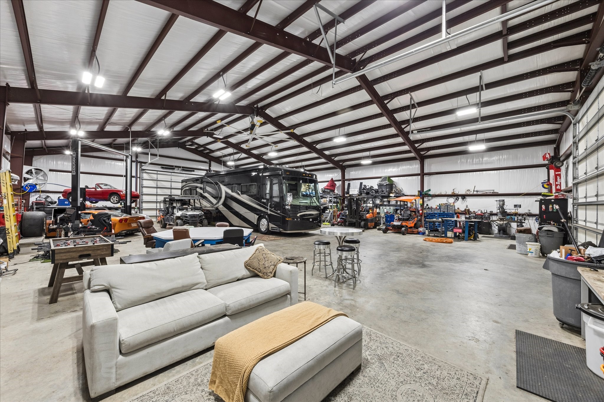 2702 Horseshoe Lane Rosharon, TX 77583 - Photo 5 of 43 Incredible 4,800-square-foot insulated and climate-controlled shop designed for work, storage, and recreation