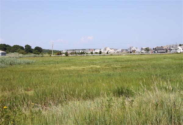 10 Cliff Estates Road, Unit 10 Scituate, MA 02066 - Photo 22 of 26 a view of a field with an ocean